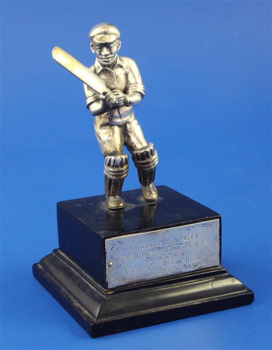 An early 20th century Indian silver model of a cricketer, probably Prince Ranjitsinhji, overall 5.5in.